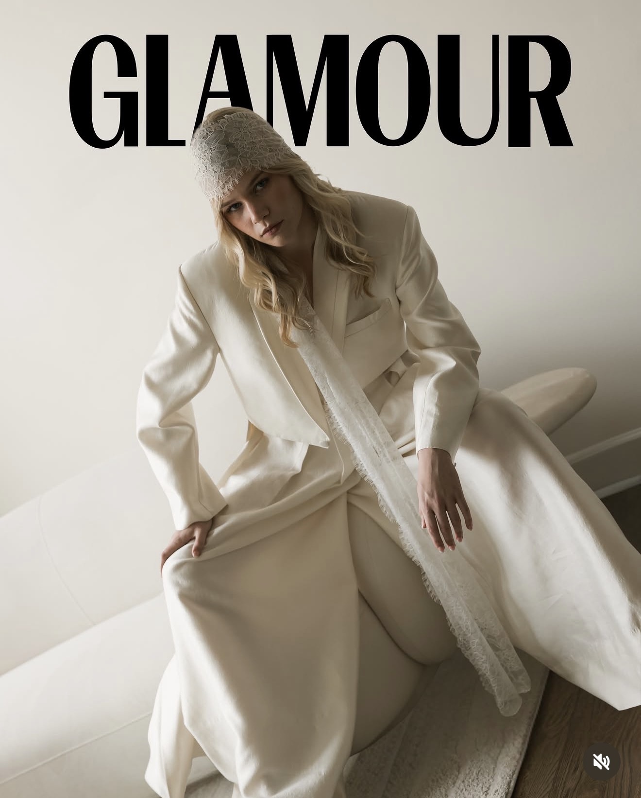 Glamour magazine feature of a bride in a lace veil and ivory tailoring